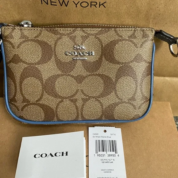 Coach Wristlet NWT. Brand New come with gift box&paper bag. 😊 Price is Firm😊 - Picture 5 of 12